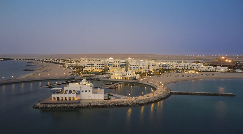 Hilton Salwa Beach Resort & Villas — Hotel building in Abu Samra