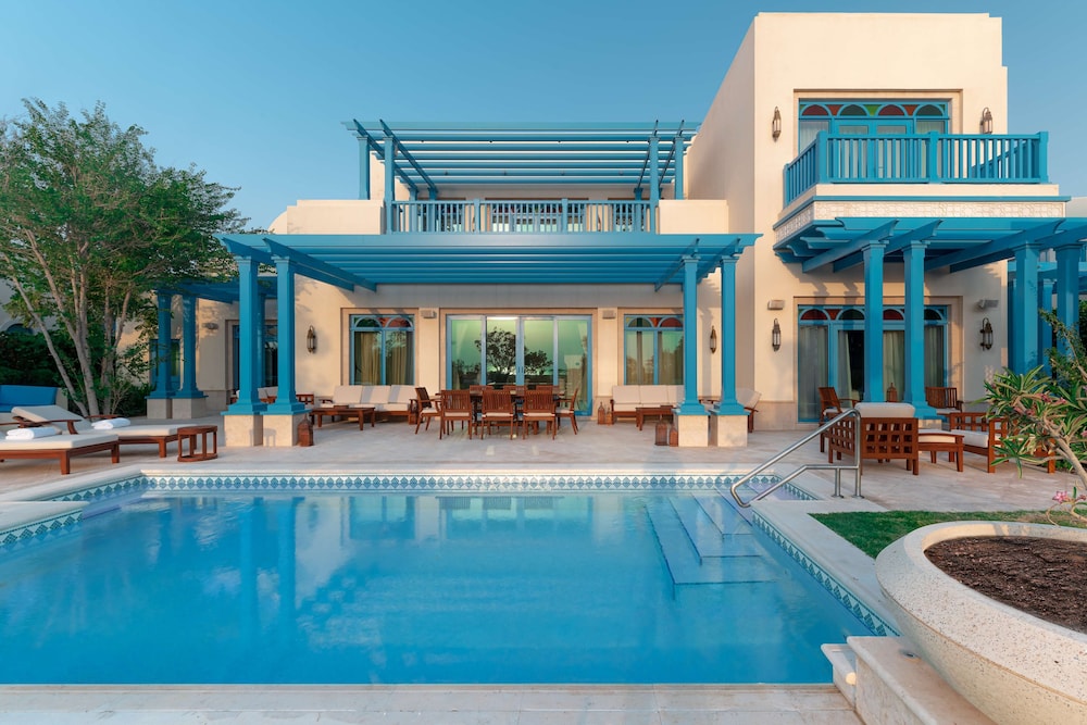 Hilton Salwa Beach Resort & Villas — Swimming pool in Abu Samra