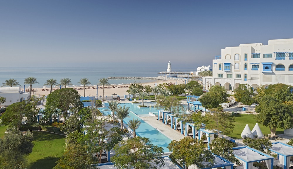 Hilton Salwa Beach Resort & Villas — Swimming pool in Abu Samra