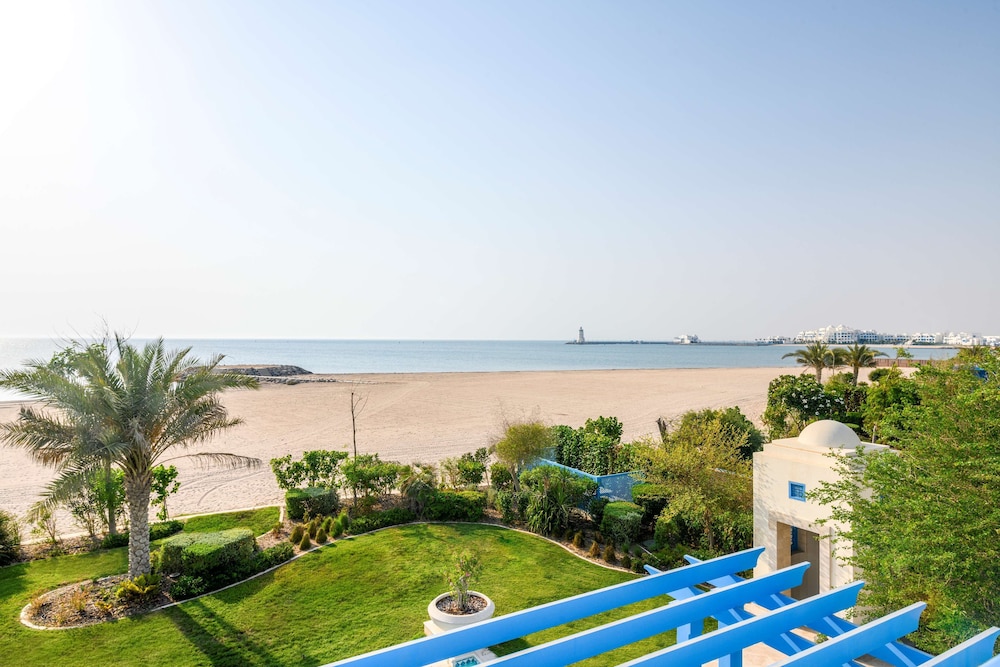 Hilton Salwa Beach Resort & Villas — Beach in Abu Samra