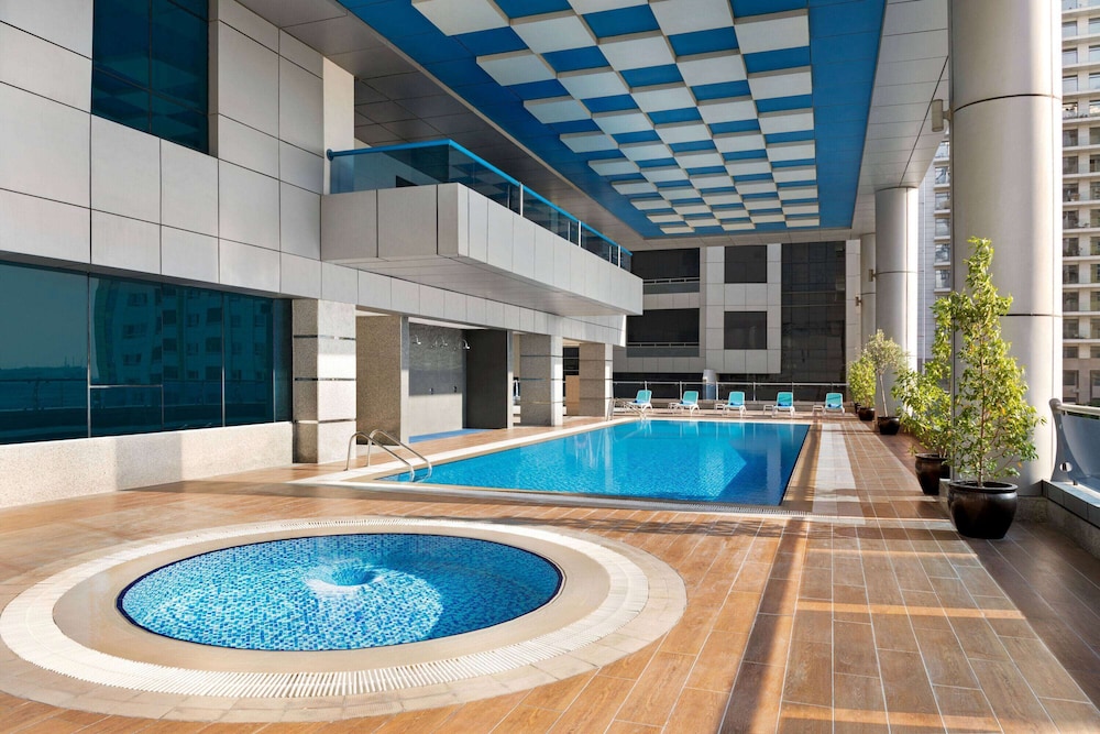 Ramada by Wyndham Dubai Barsha Heights — Swimming pool in Dubai