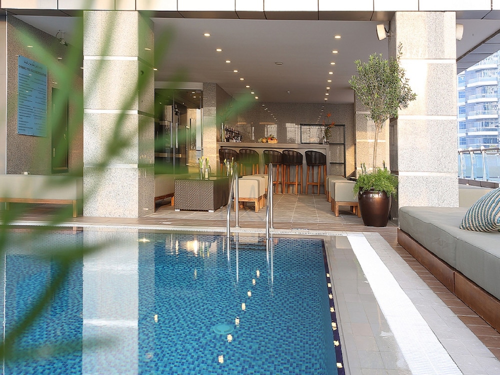Ramada by Wyndham Dubai Barsha Heights — Swimming pool in Dubai