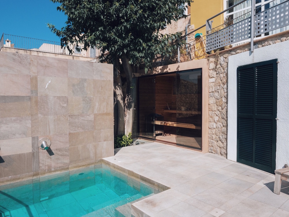 Can Cota Suites & Spa - Turismo de interior — Swimming pool in Selva, Balearic Islands
