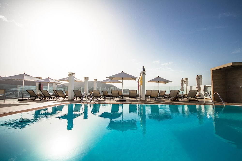 IG Nachosol Premium Apartments by Servatur - Adults Only — Swimming pool in Puerto Rico, Canary Islands