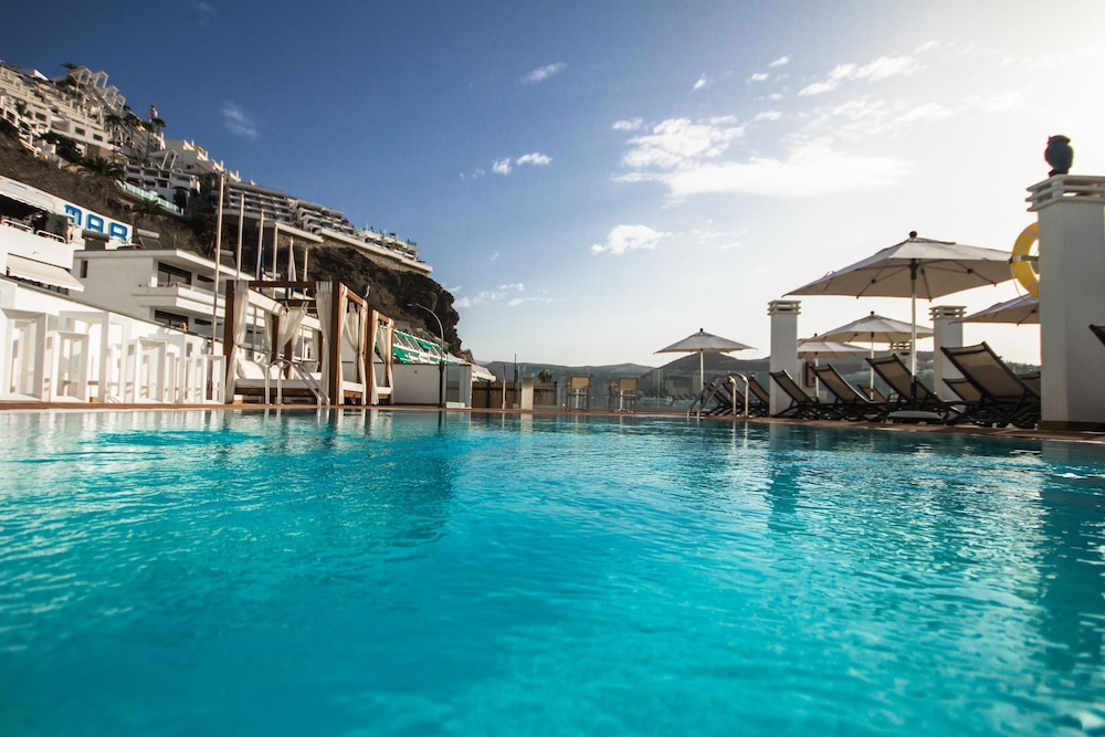 IG Nachosol Premium Apartments by Servatur - Adults Only — Swimming pool in Puerto Rico, Canary Islands