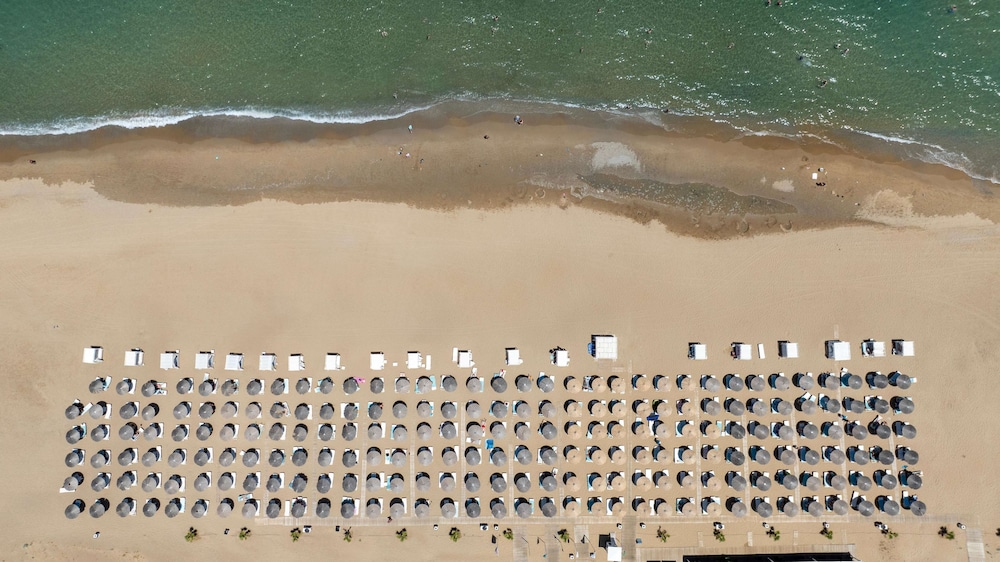 Anemos Luxury Grand Resort — Beach in Georgioupolis