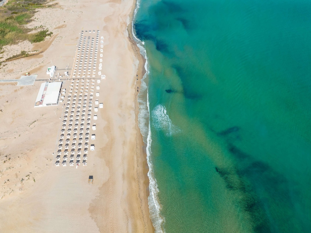 Anemos Luxury Grand Resort — Beach in Georgioupolis