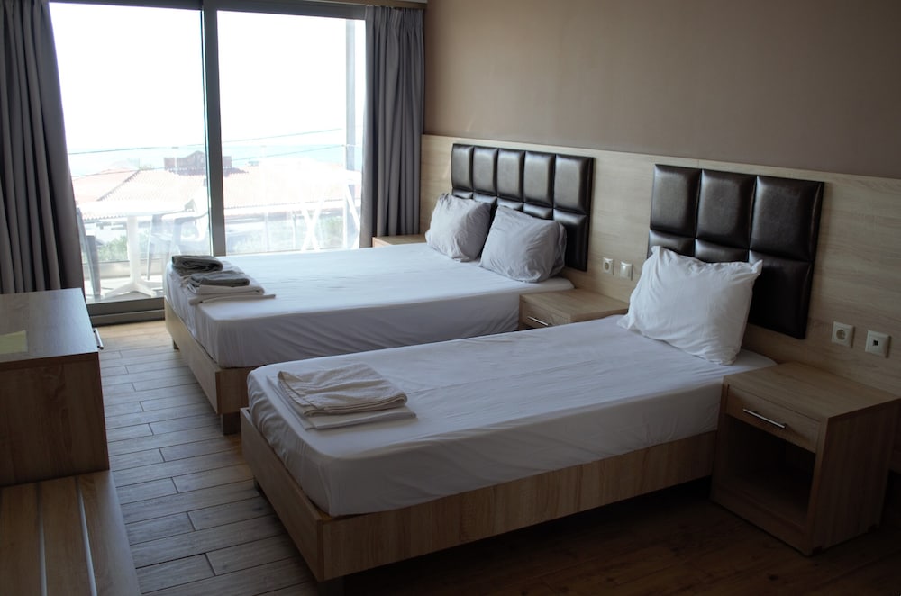 Coralli Apartments — Hotel rooms in Pefkos, South Aegean