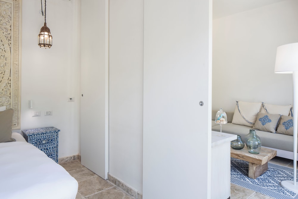 Falkensteiner Resort Capo Boi — Hotel rooms in Villasimius, Sardinia