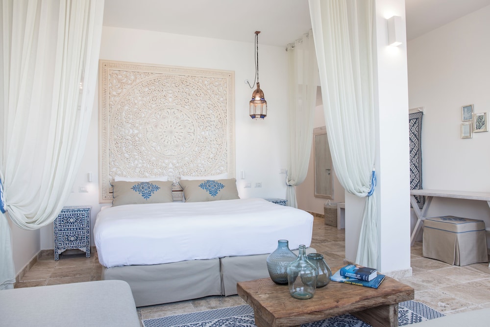 Falkensteiner Resort Capo Boi — Hotel rooms in Villasimius, Sardinia