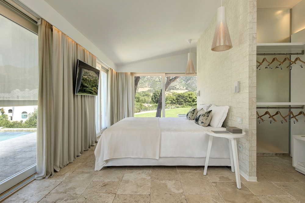 Falkensteiner Resort Capo Boi — Hotel rooms in Villasimius, Sardinia