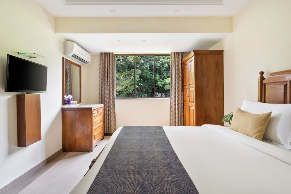 De Mandarin Beach Resort Suites & Villas — Hotel rooms in Candolim, Goa