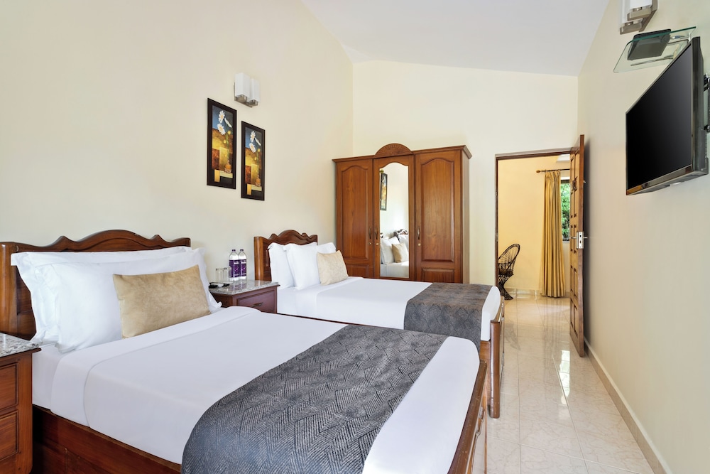 De Mandarin Beach Resort Suites & Villas — Hotel rooms in Candolim, Goa