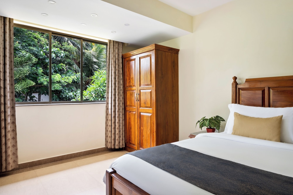 De Mandarin Beach Resort Suites & Villas — Hotel rooms in Candolim, Goa