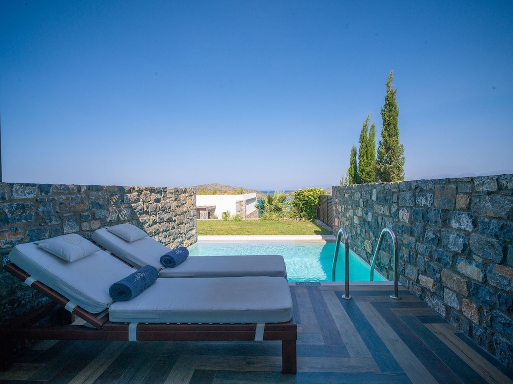 Royal Marmin Bay Boutique & Art Hotel - Adults Only — Swimming pool in Elounda