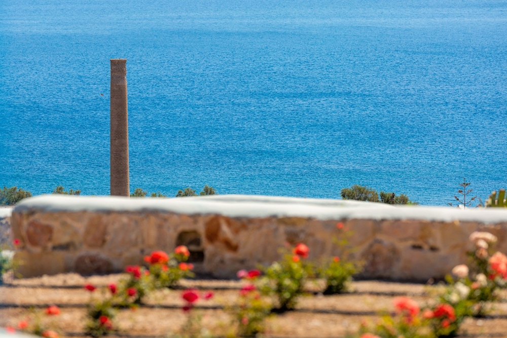 Desiterra Resort & Spa — Beach in Karterados, South Aegean