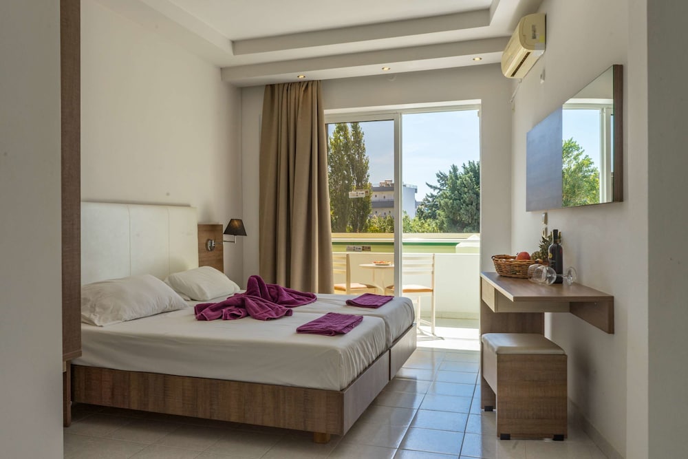 Stamos Hotel — Hotel rooms in Faliraki, South Aegean
