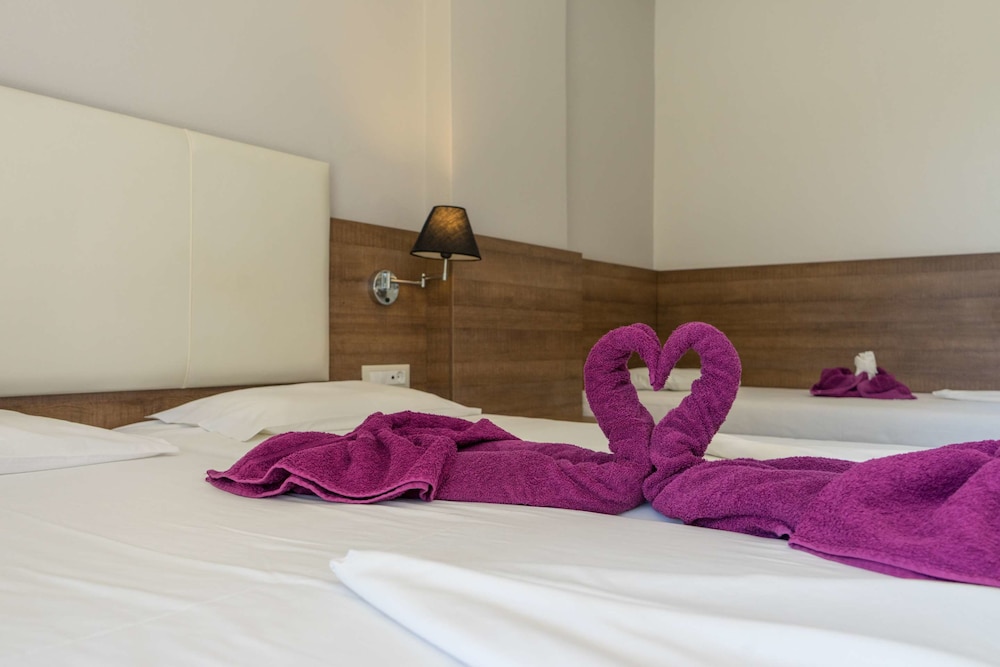 Stamos Hotel — Hotel rooms in Faliraki, South Aegean