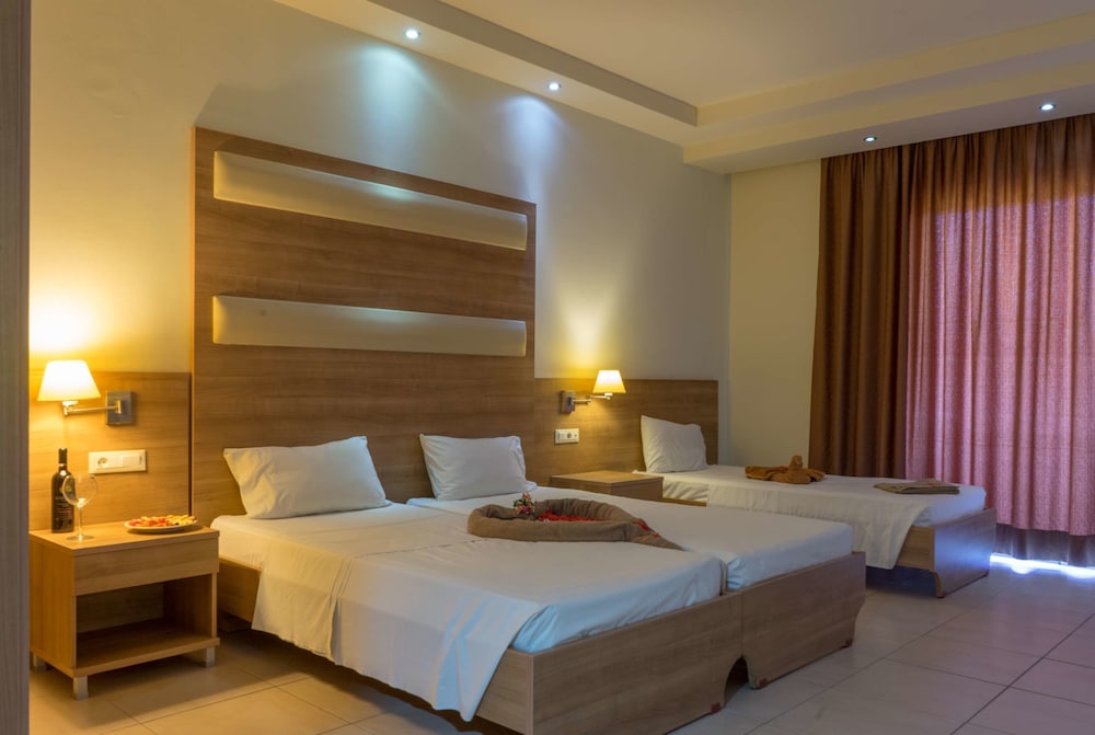 Stamos Hotel — Hotel rooms in Faliraki, South Aegean