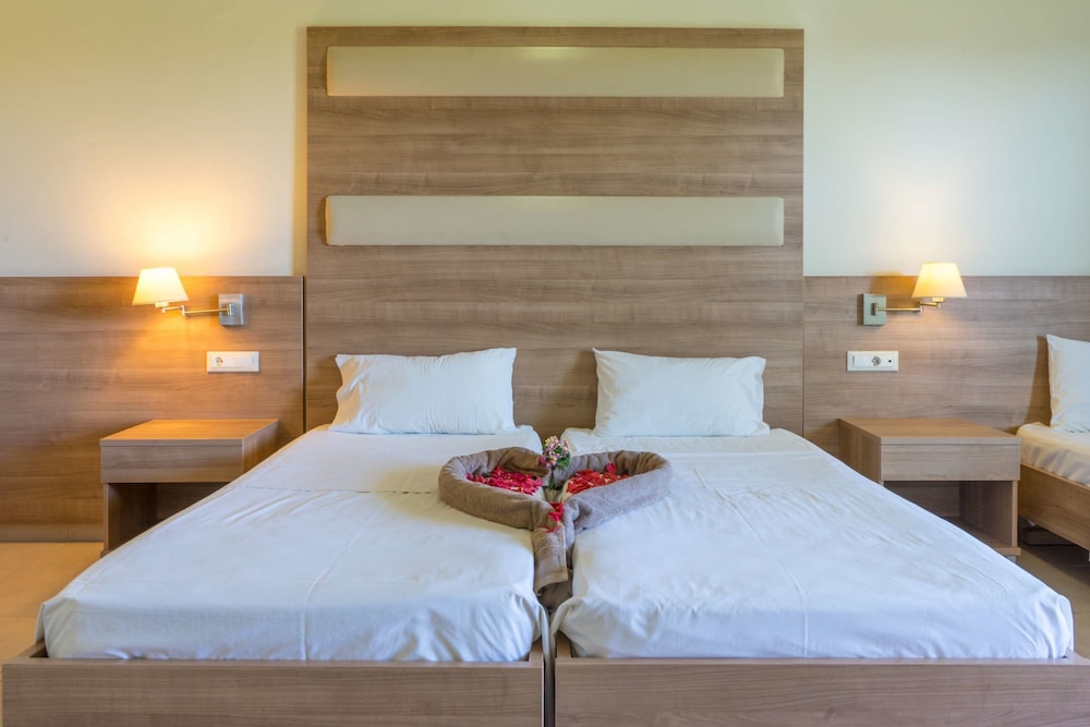 Stamos Hotel — Hotel rooms in Faliraki, South Aegean