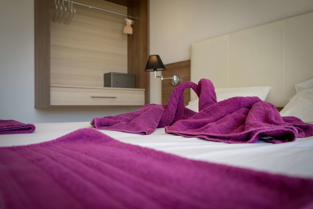 Stamos Hotel — Hotel rooms in Faliraki, South Aegean