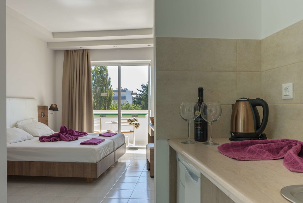 Stamos Hotel — Hotel rooms in Faliraki, South Aegean
