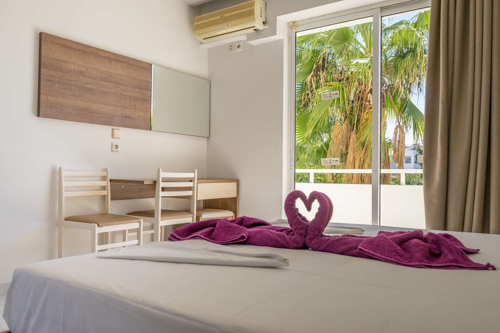 Stamos Hotel — Hotel rooms in Faliraki, South Aegean