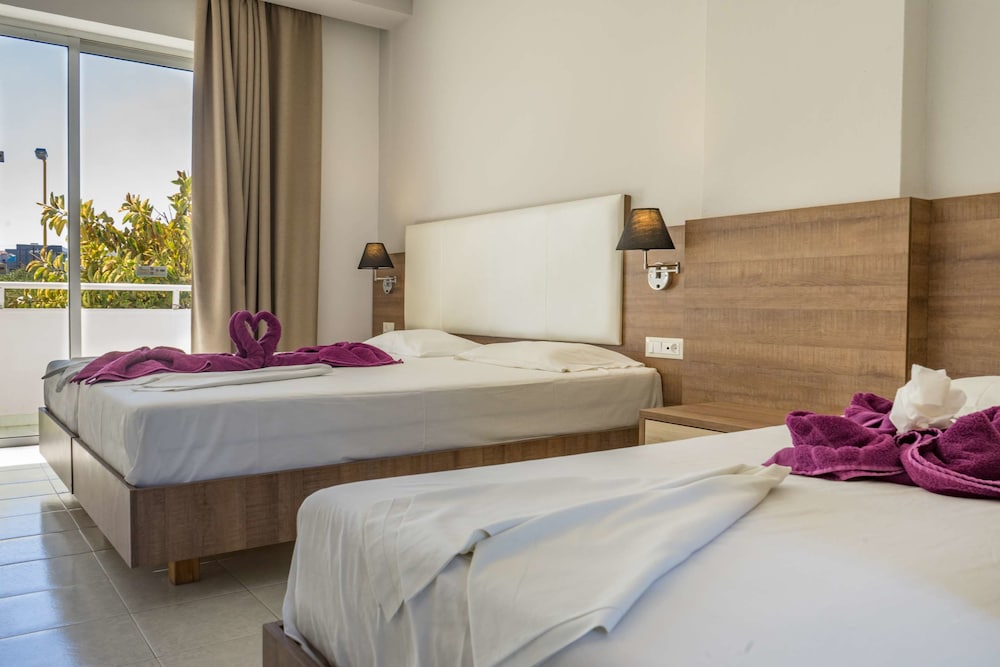 Stamos Hotel — Hotel rooms in Faliraki, South Aegean