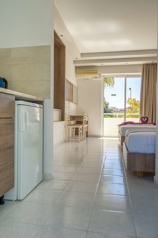Stamos Hotel — Hotel rooms in Faliraki, South Aegean