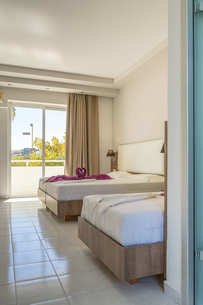 Stamos Hotel — Hotel rooms in Faliraki, South Aegean