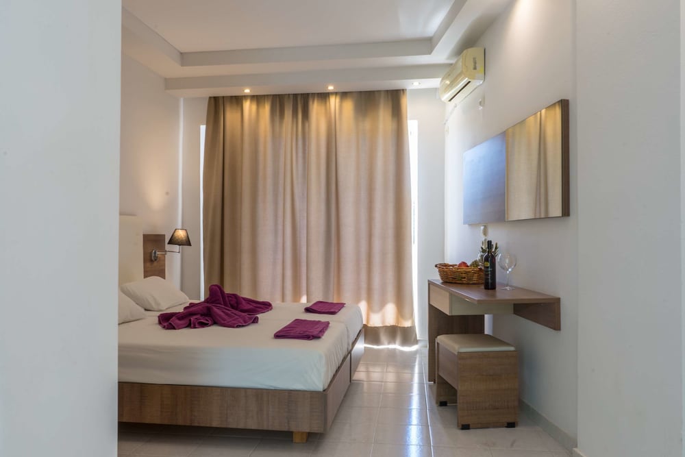 Stamos Hotel — Hotel rooms in Faliraki, South Aegean